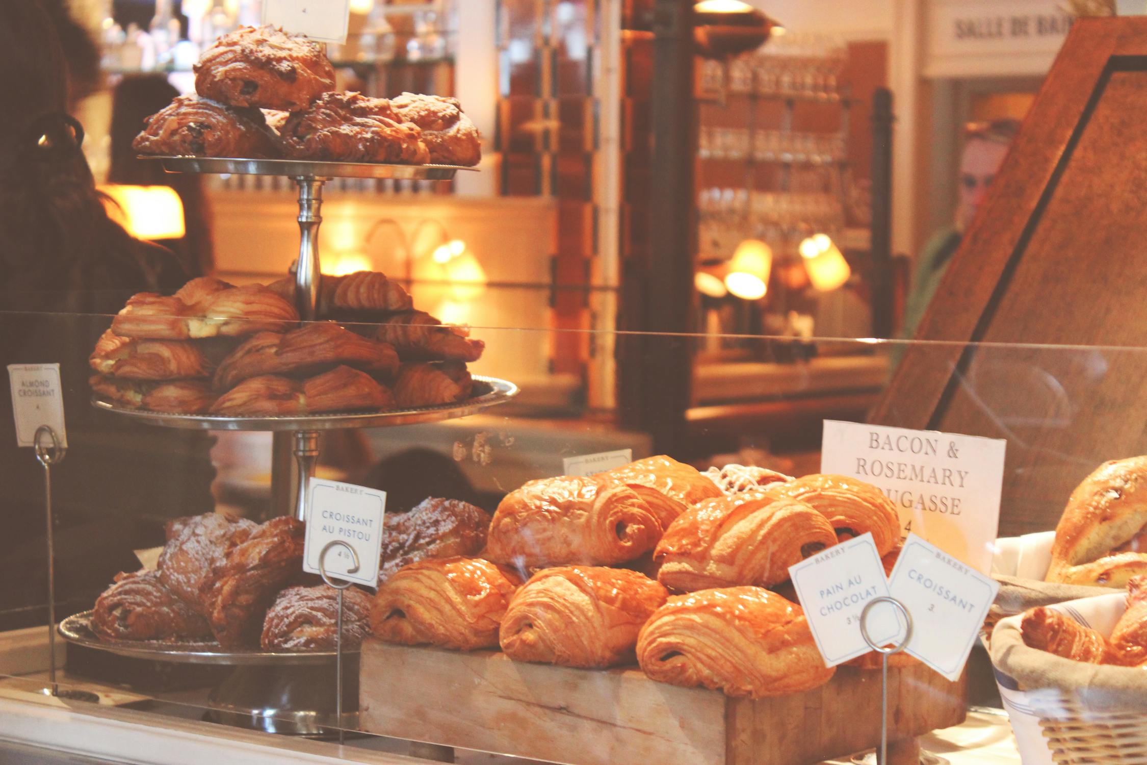 a french pastry store with baked goods, to show, why we eat what we eat